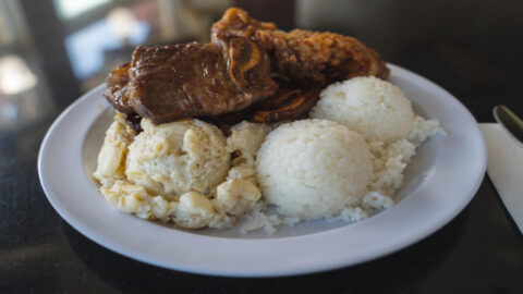 A plate lunch on Maui with white rice, macaroni salad, and teriyaki pork